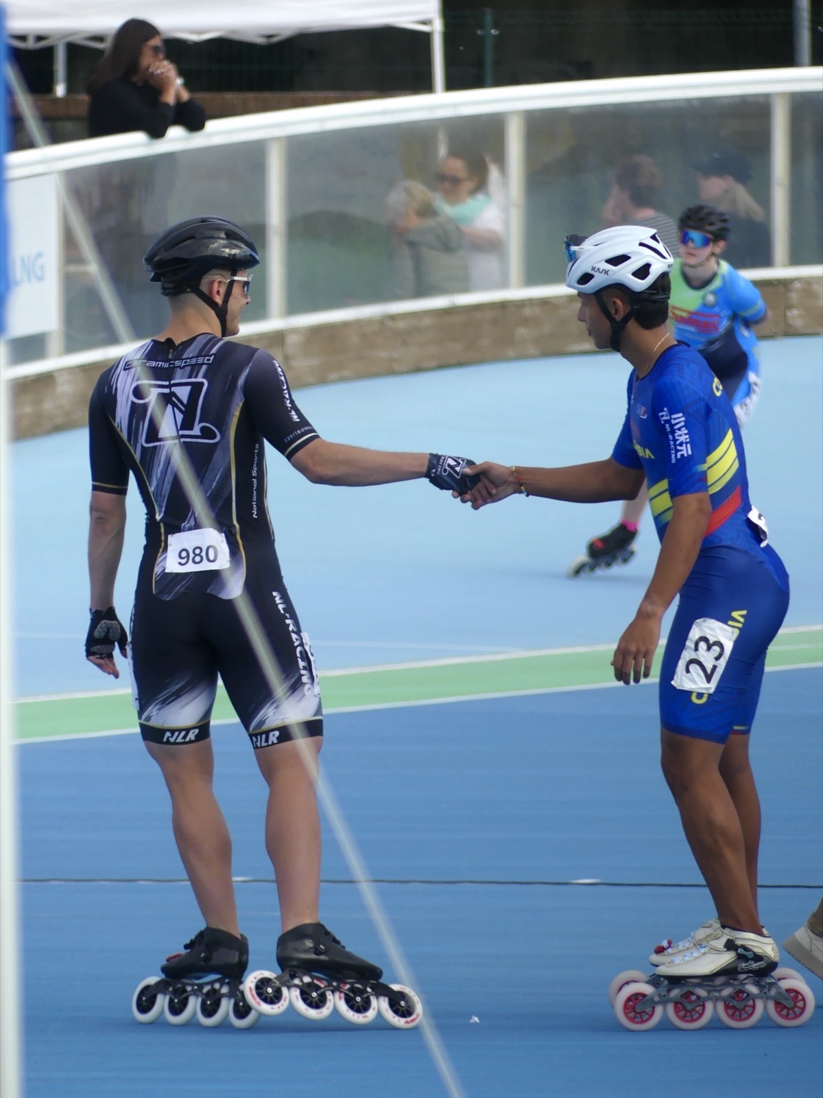 Sportsmanship handshake with a competitor after the race in Rovigo